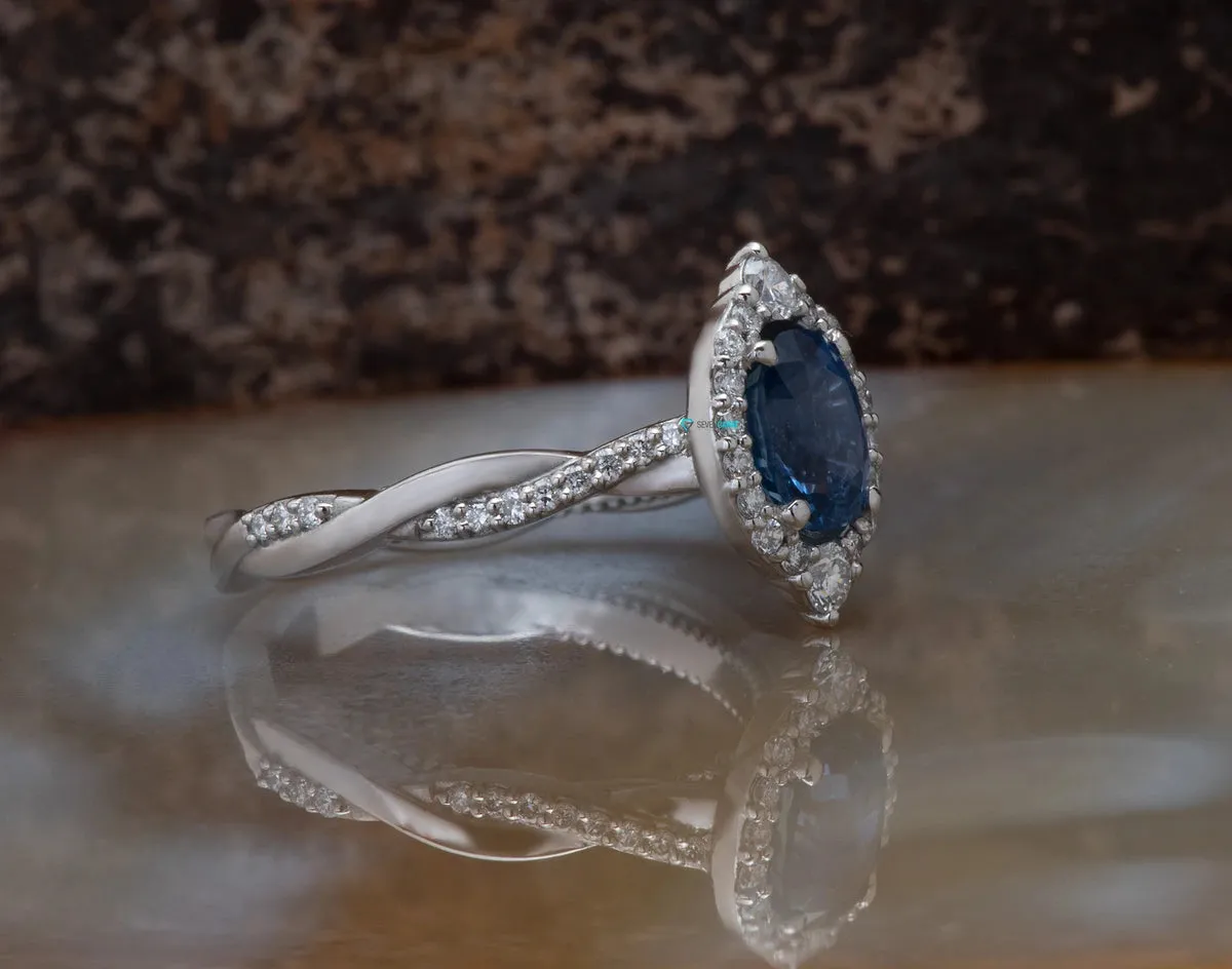 1.5 carat blue sapphire vintage engagement ring