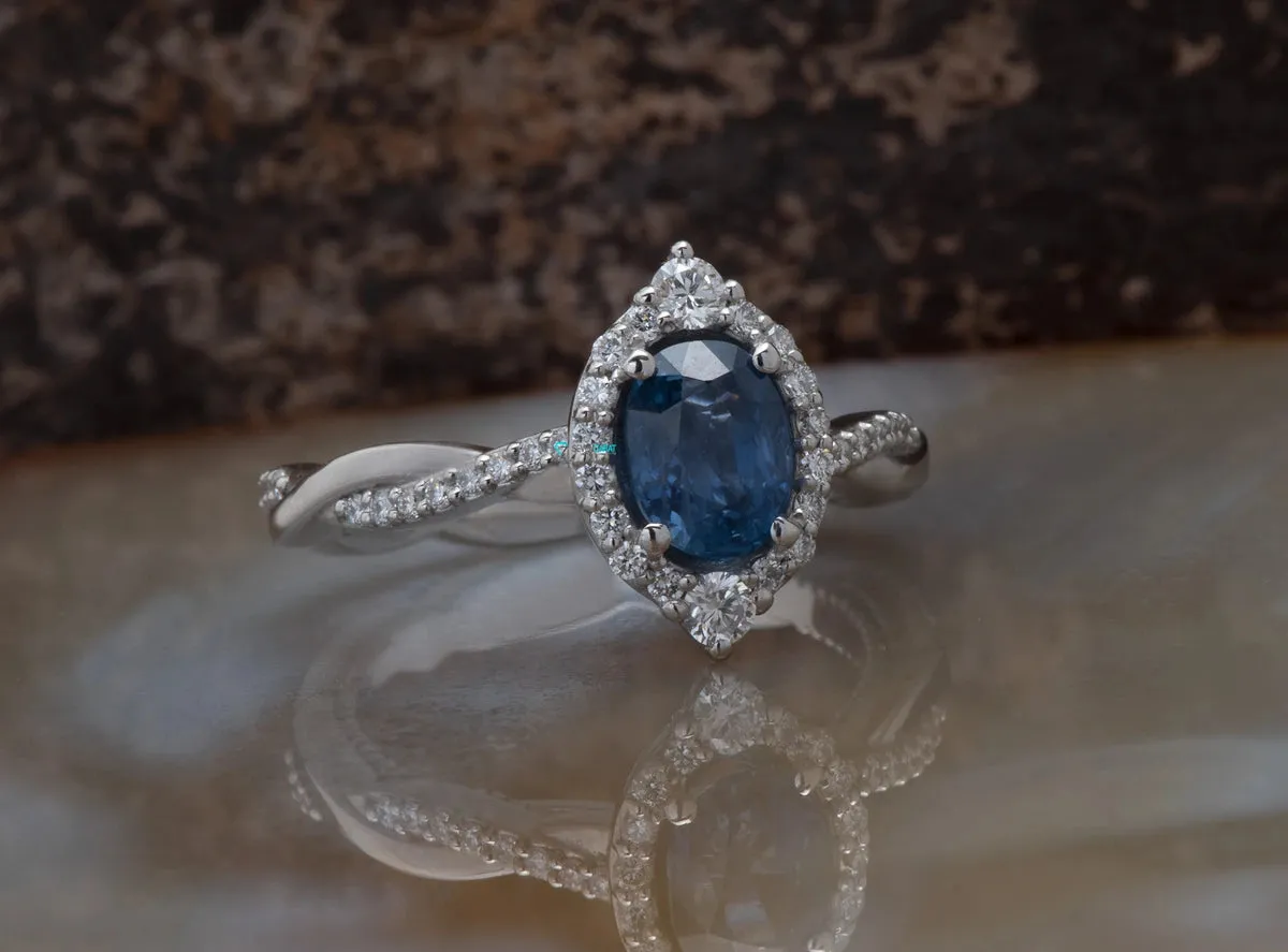 1.5 carat blue sapphire vintage engagement ring