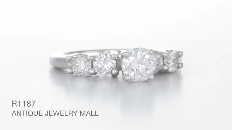 1960's Floating Diamonds Vintage Engagement Ring in Platinum