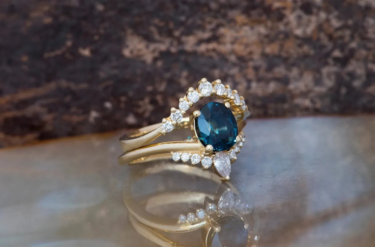 Alternative engagement ring set with Blue Green Sapphire and diamonds