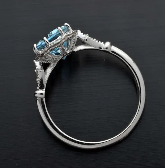 Aqua Marine Daisy oval halo engagement ring vintage inspired