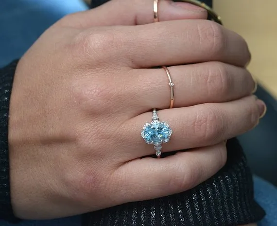 Aqua Marine Daisy oval halo engagement ring vintage inspired