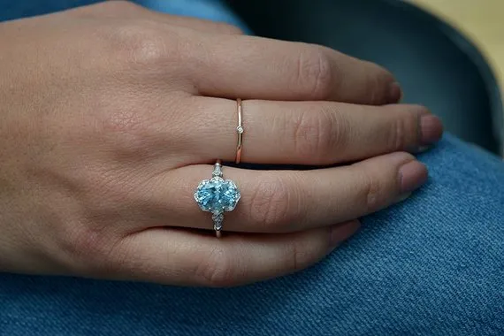 Aqua Marine Daisy oval halo engagement ring vintage inspired