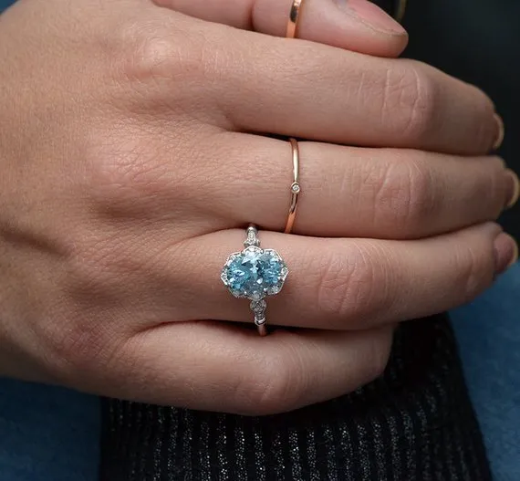 Aqua Marine Daisy oval halo engagement ring vintage inspired