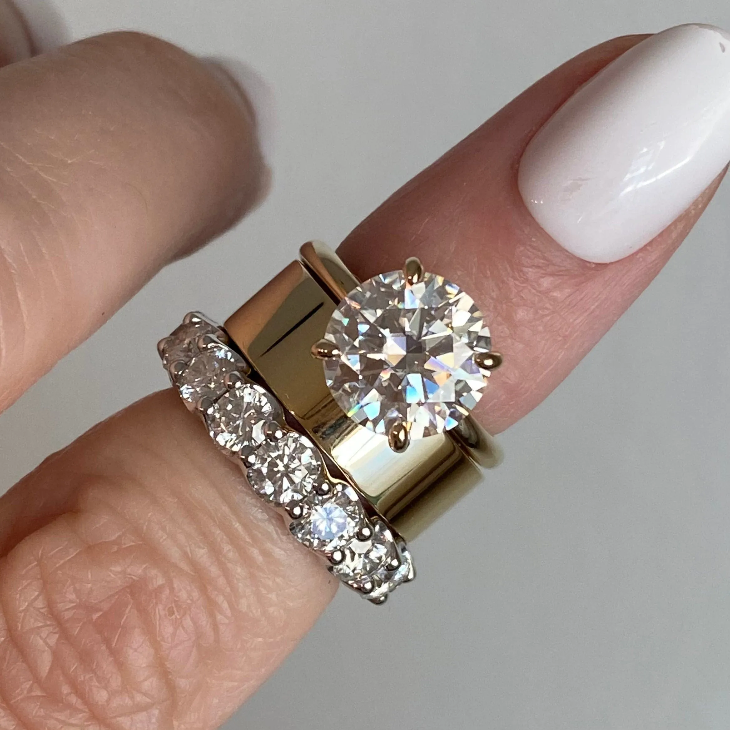 Danielle 4-Prong (3ct) Round Moissanite Engagement Ring