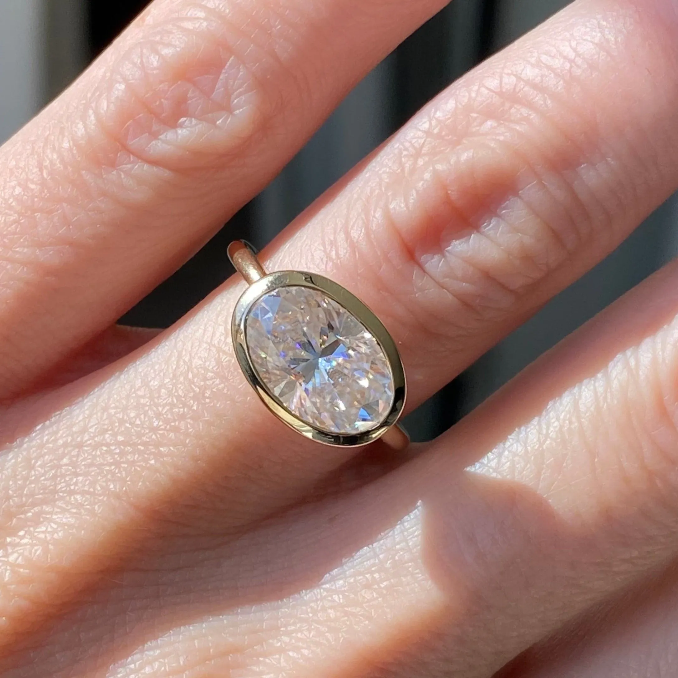 East West Bella (4.7ct) Oval Moissanite Engagement Ring