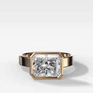 Finest Bezel Set Engagement Ring With East West Elongated Radiant Cut Diamond