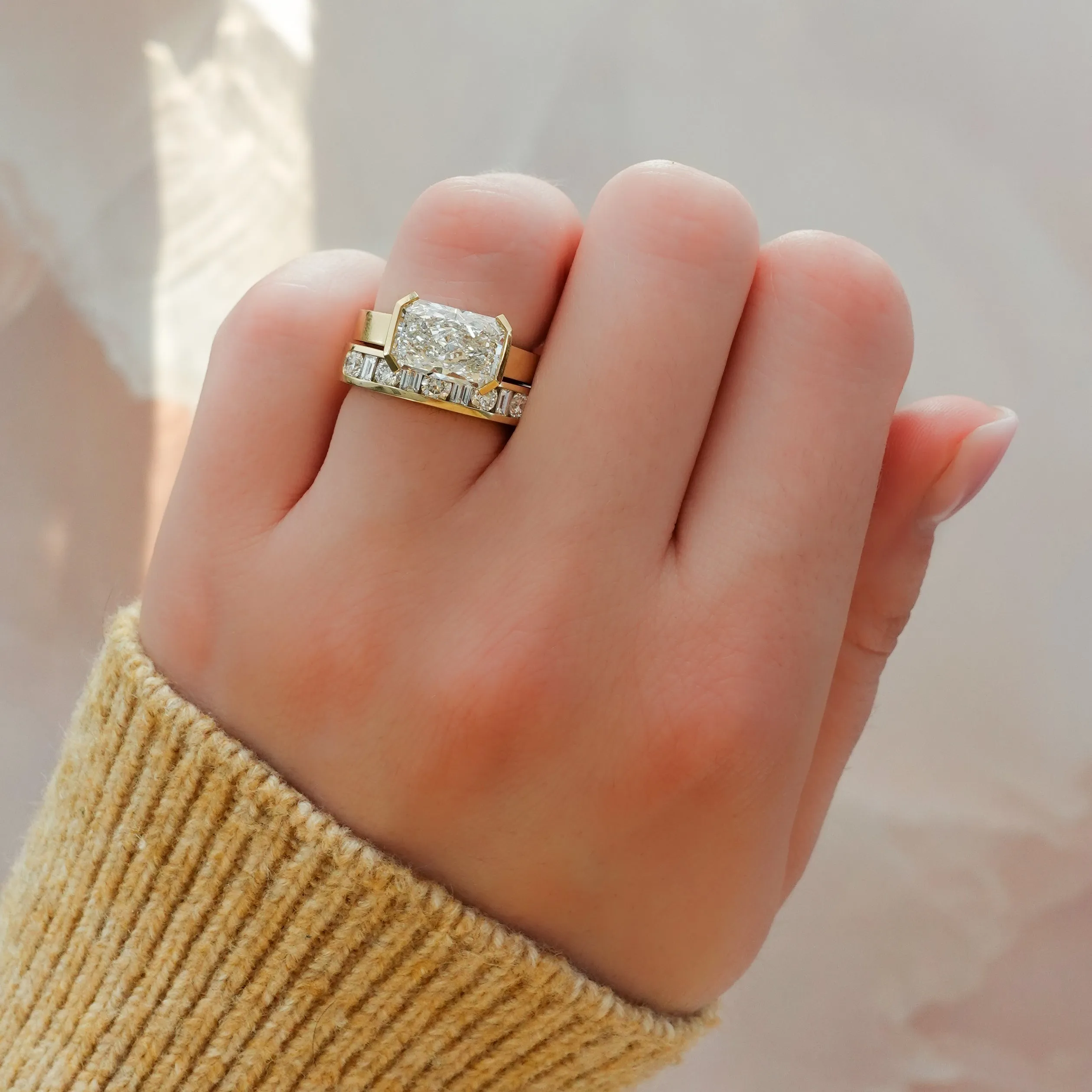 Finest Half Bezel Solitaire Engagement Ring With East West Elongated Radiant Cut Diamond