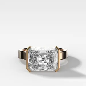 Finest Half Bezel Solitaire Engagement Ring With East West Elongated Radiant Cut Diamond