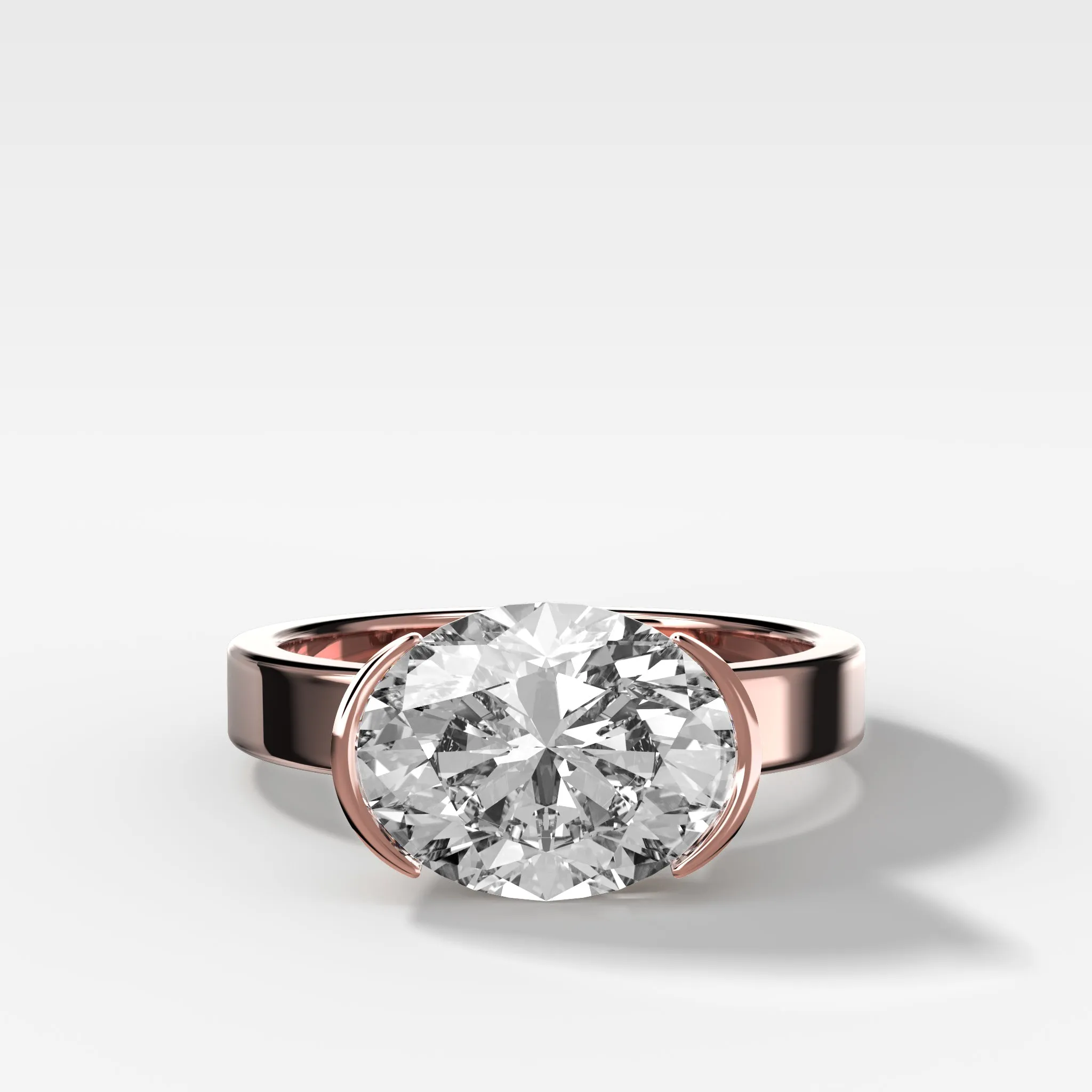 Finest Half Bezel Solitaire Engagement Ring With East West Oval Cut Diamond