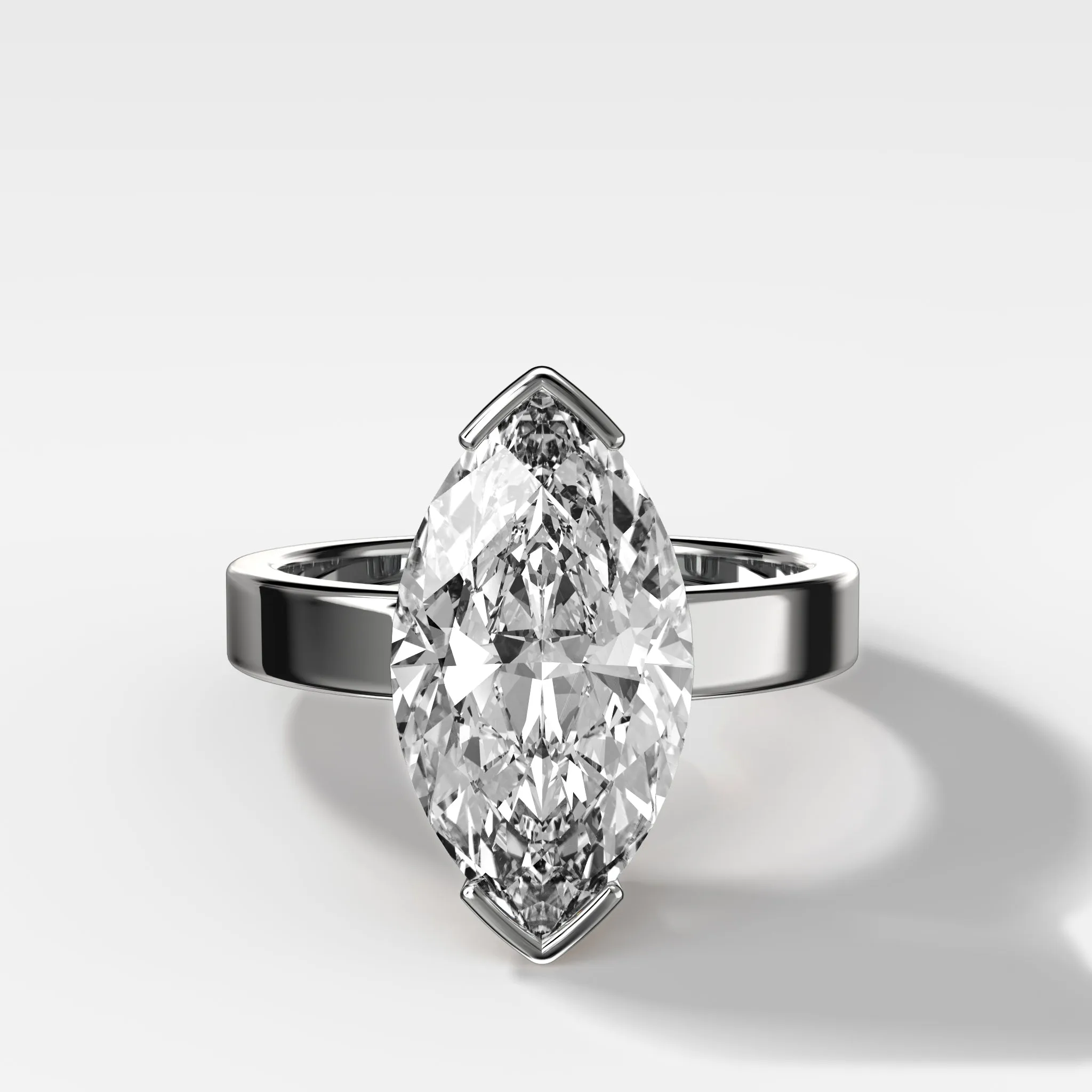 Finest Half Bezel Solitaire Engagement Ring With Marquise Cut Diamond