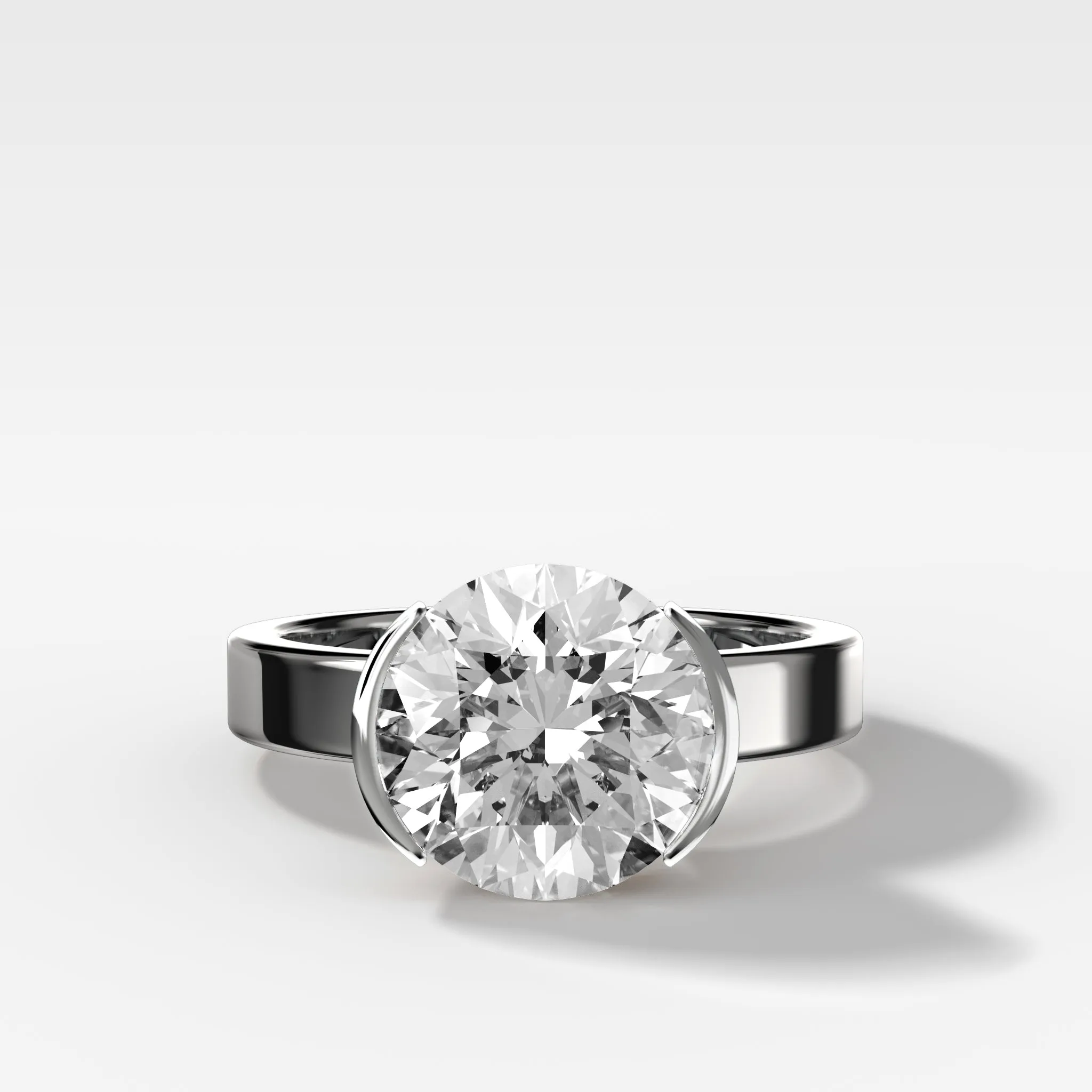 Finest Half Bezel Solitaire Engagement Ring With Round Cut Diamond