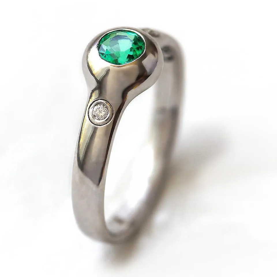 Gumpha - Emerald engagement ring with Diamonds