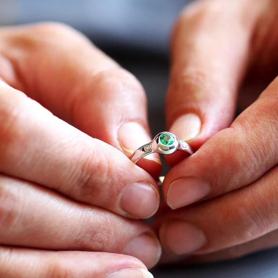 Gumpha - Emerald engagement ring with Diamonds