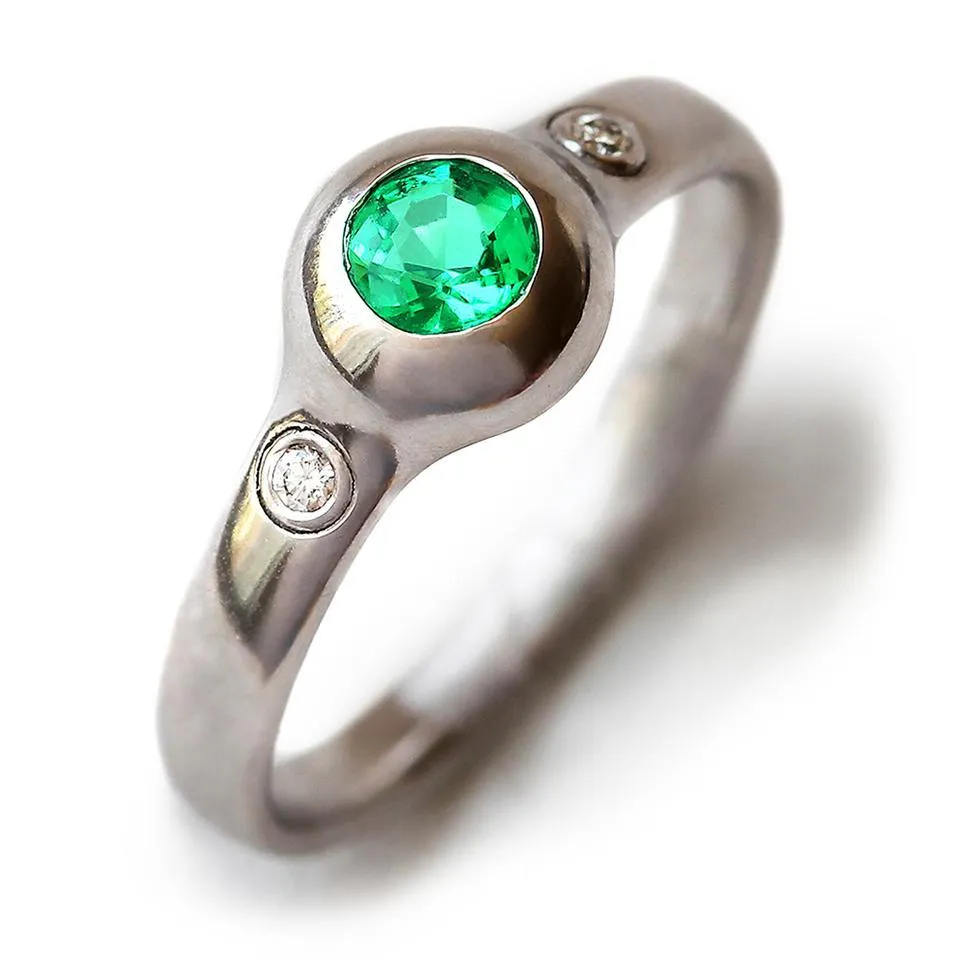 Gumpha - Emerald engagement ring with Diamonds