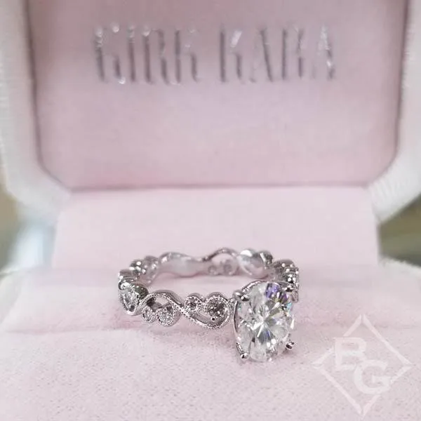 Kirk Kara "Angelique" Oval Cut Moissanite Center Scroll Work Engagement Ring