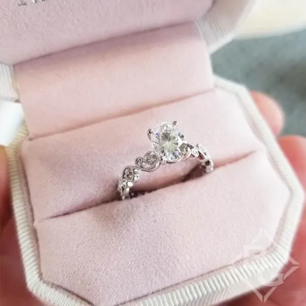 Kirk Kara "Angelique" Oval Cut Moissanite Center Scroll Work Engagement Ring