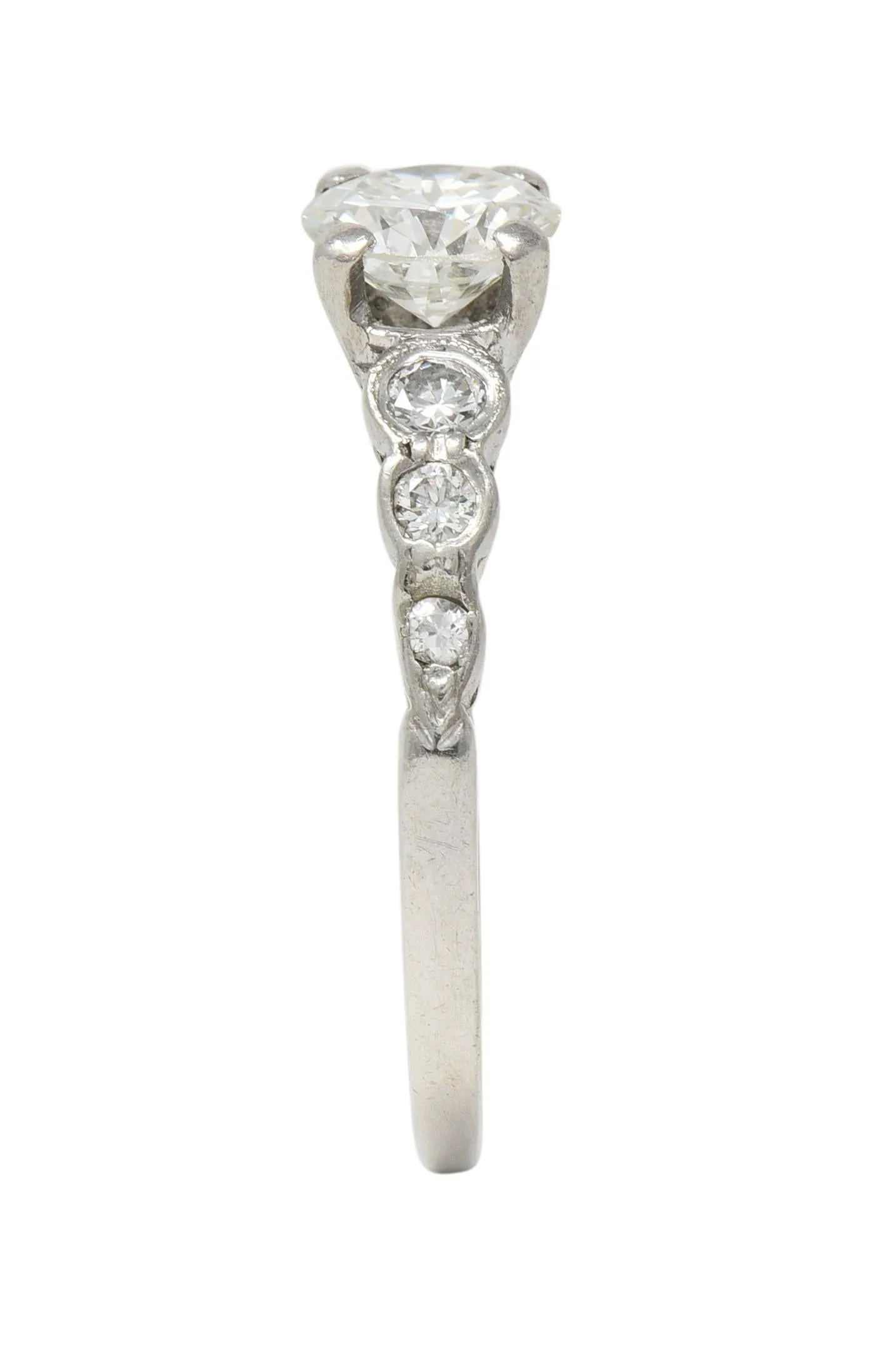 Mid-Century 0.94 CTW Old European Cut Diamond Platinum Seven Stone Vintage Engagement Ring