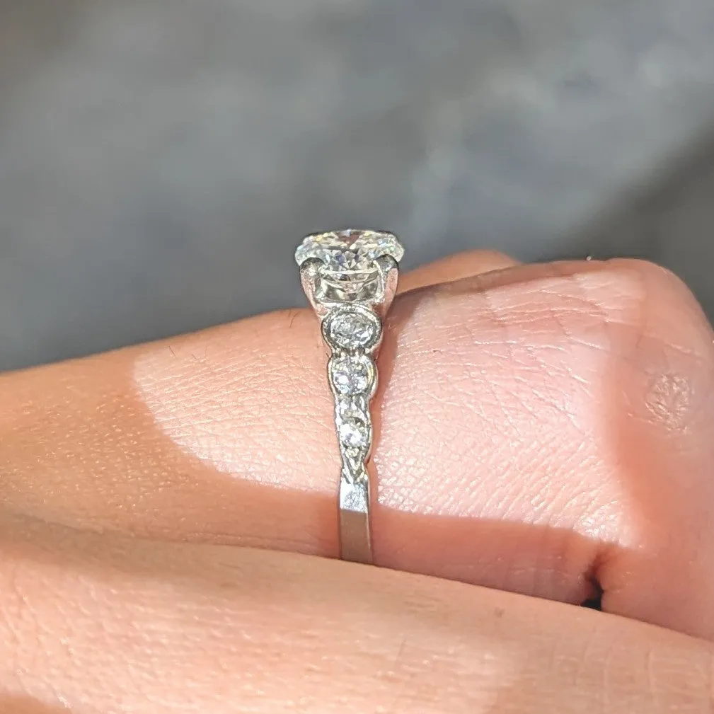 Mid-Century 0.94 CTW Old European Cut Diamond Platinum Seven Stone Vintage Engagement Ring