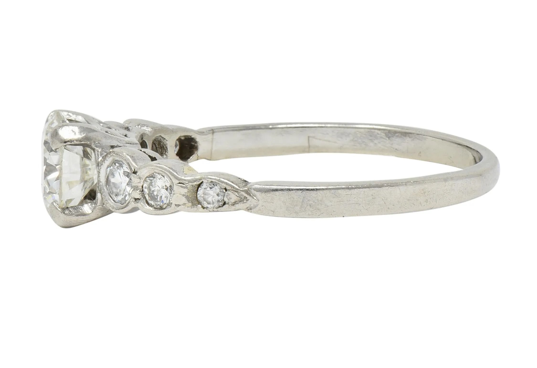 Mid-Century 0.94 CTW Old European Cut Diamond Platinum Seven Stone Vintage Engagement Ring