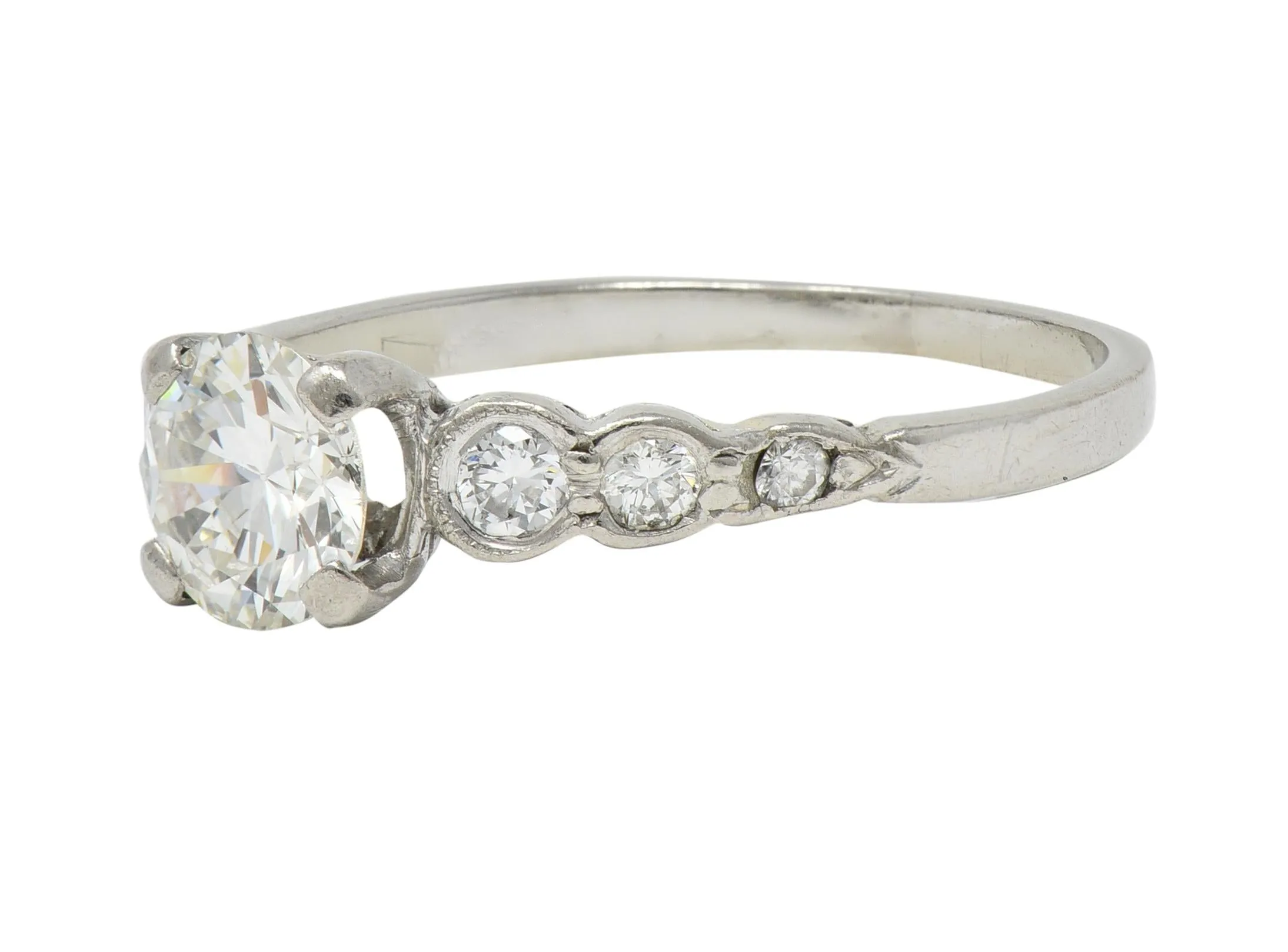 Mid-Century 0.94 CTW Old European Cut Diamond Platinum Seven Stone Vintage Engagement Ring