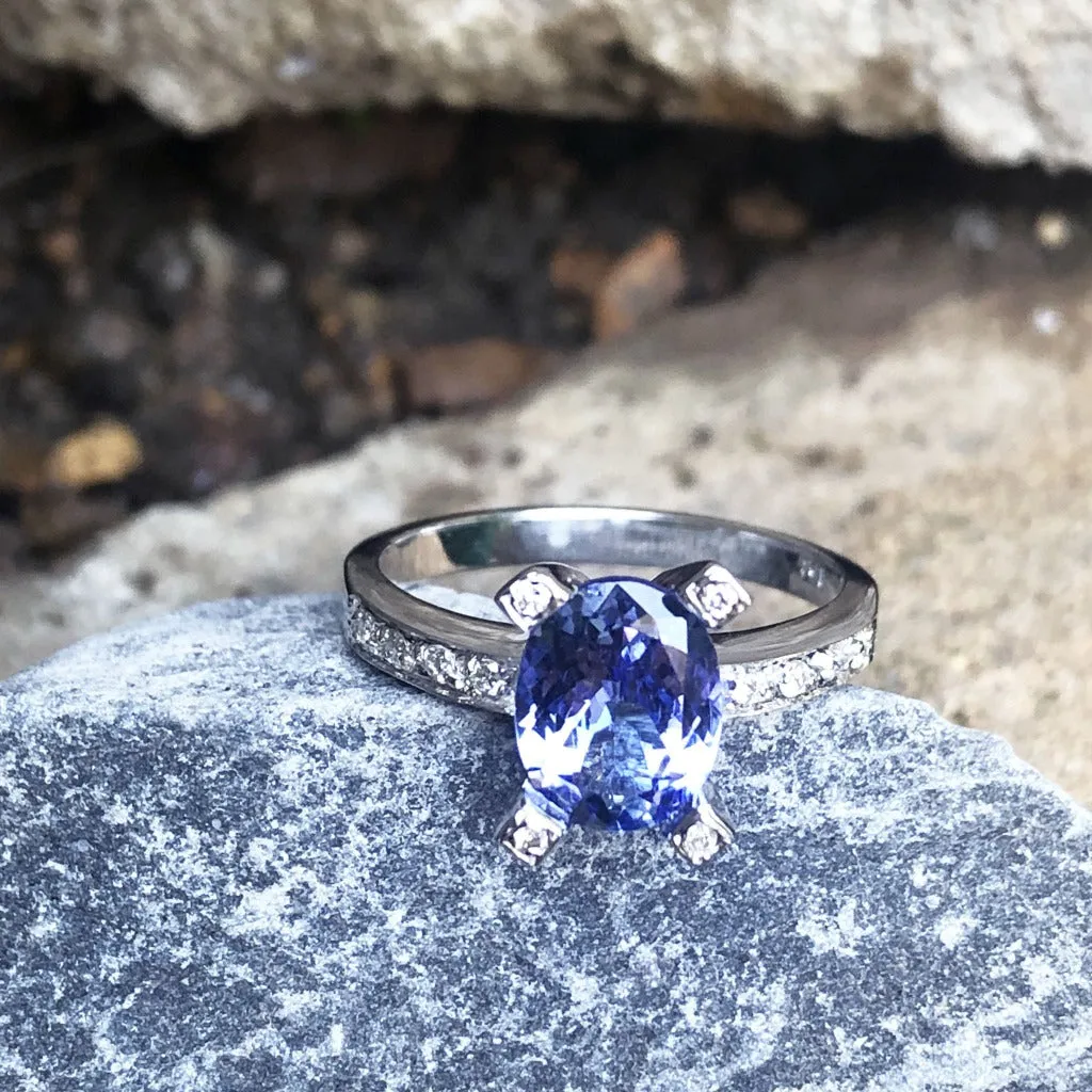 Oval Cut Solitaire Tanzanite Ring with Diamond Claw and Band Accents