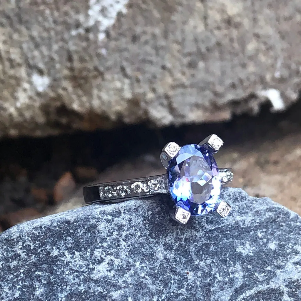 Oval Cut Solitaire Tanzanite Ring with Diamond Claw and Band Accents