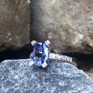 Oval Cut Solitaire Tanzanite Ring with Diamond Claw and Band Accents