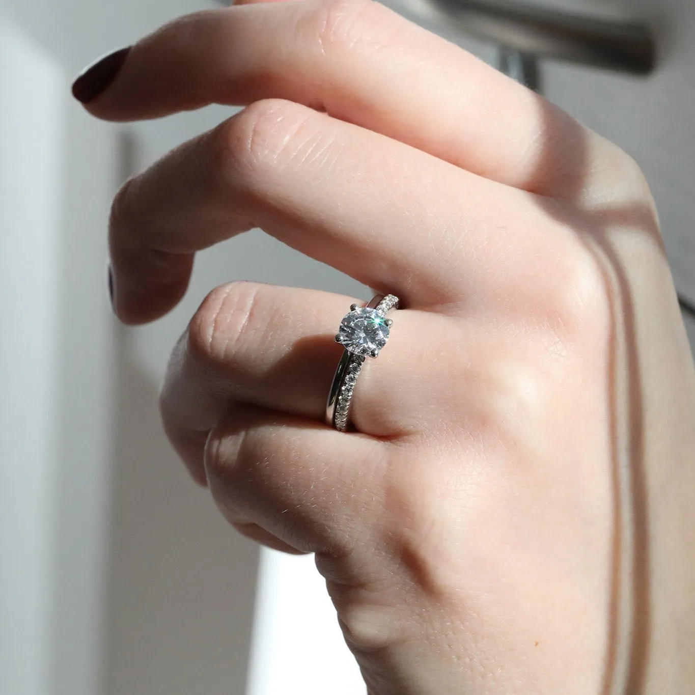 Platinum "Hidden Halo" Mount with Prong-Set Center Stone and Diamond Shoulders
