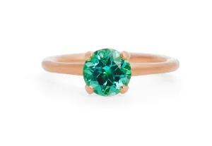 Sculpted 18ct rose gold 4 claw ring with Paraiba tourmaline