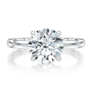 Solitaire Engagement Ring with Surprise Diamonds