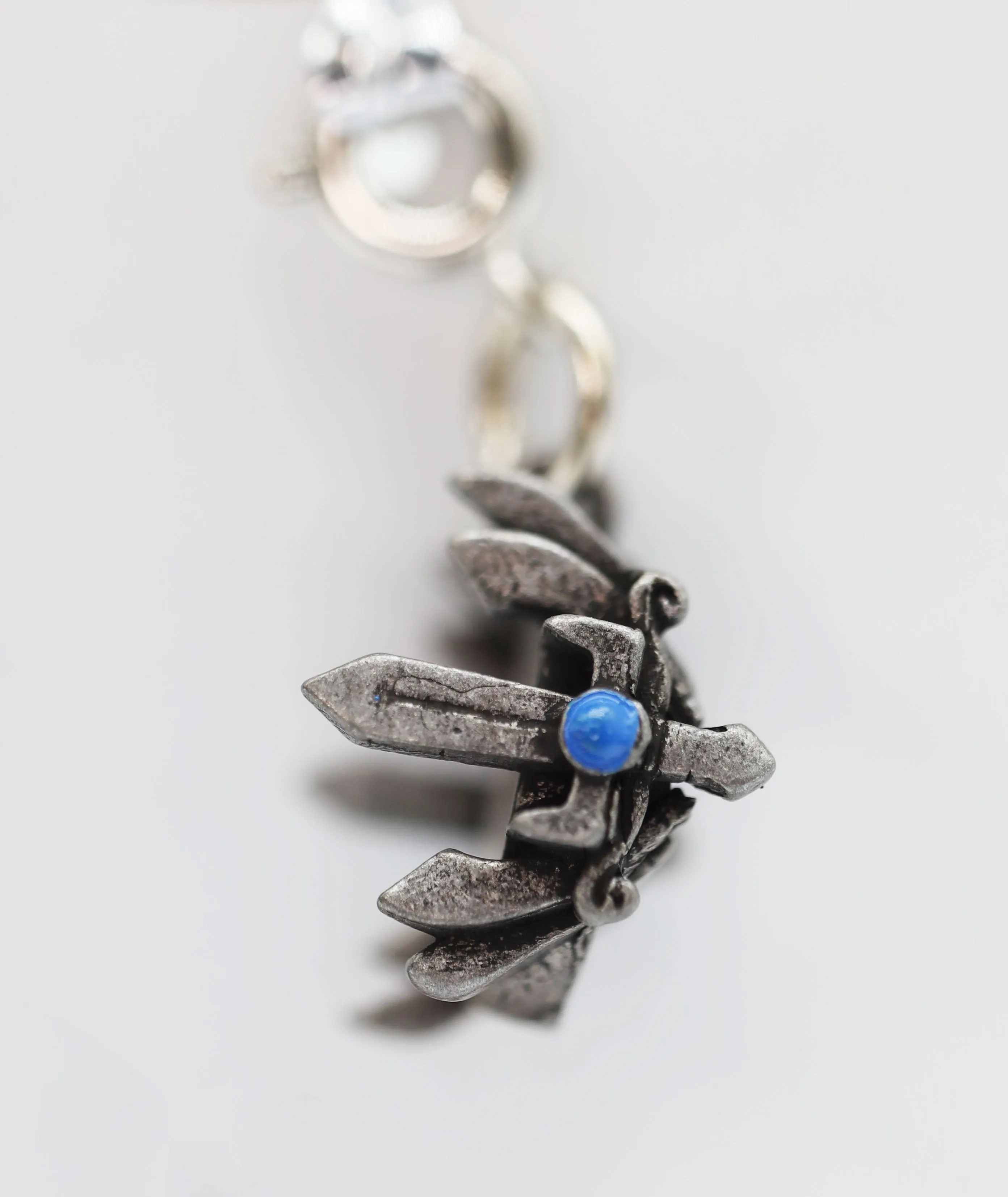 Traveler's Trinkets: Sword Crown Charm