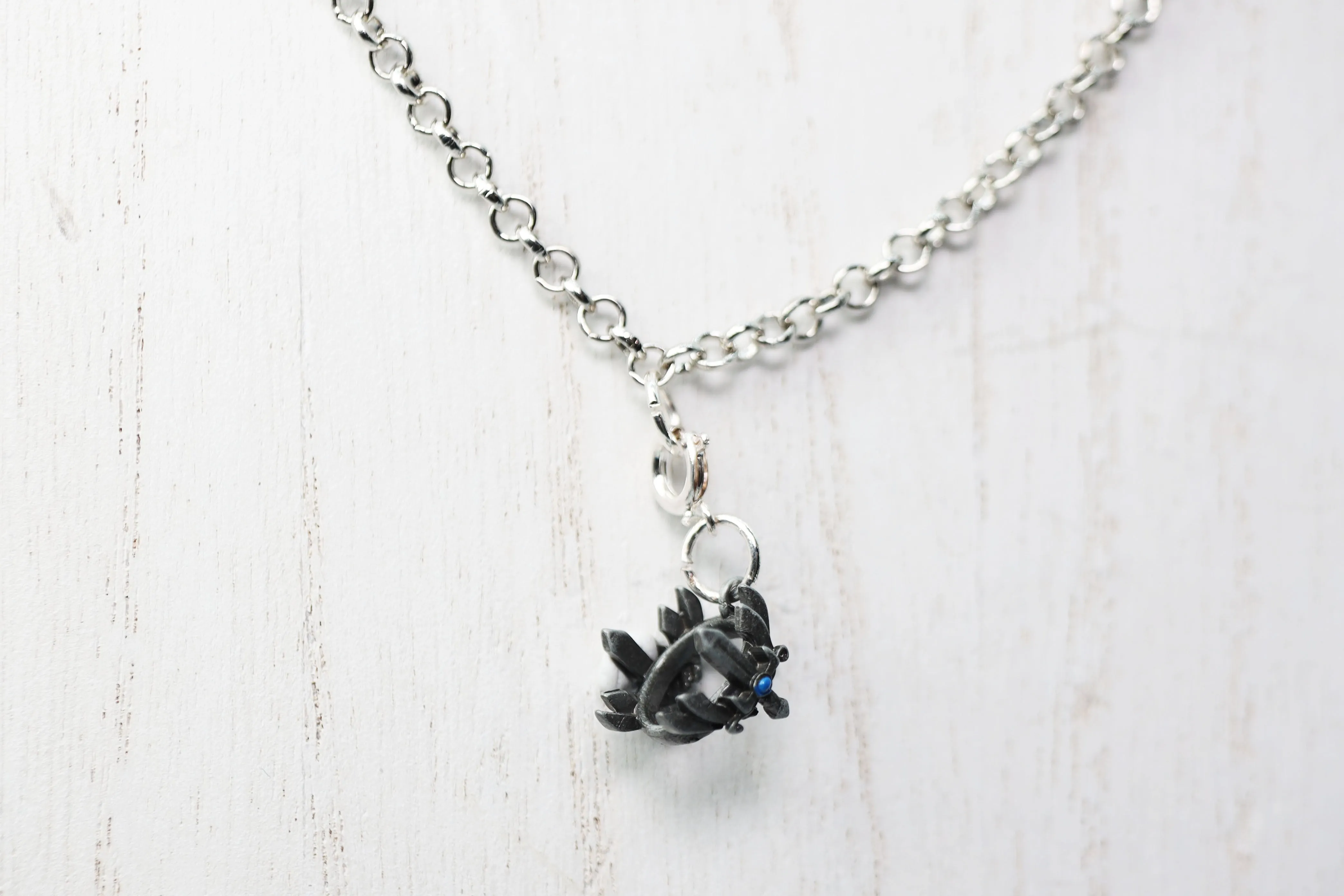 Traveler's Trinkets: Sword Crown Charm