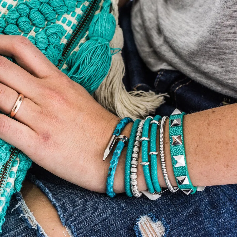Turquoise stingray bracelet with silver studs for woman