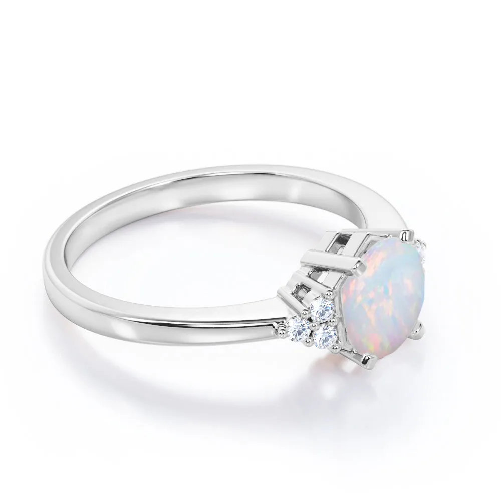 Unique Tapered style 1 carat Round cut Opal and diamond 7 stone engagement ring in Yellow gold