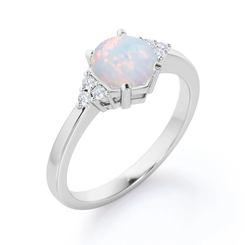 Unique Tapered style 1 carat Round cut Opal and diamond 7 stone engagement ring in Yellow gold