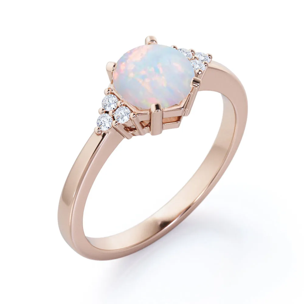 Unique Tapered style 1 carat Round cut Opal and diamond 7 stone engagement ring in Yellow gold