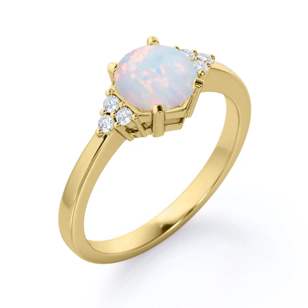 Unique Tapered style 1 carat Round cut Opal and diamond 7 stone engagement ring in Yellow gold