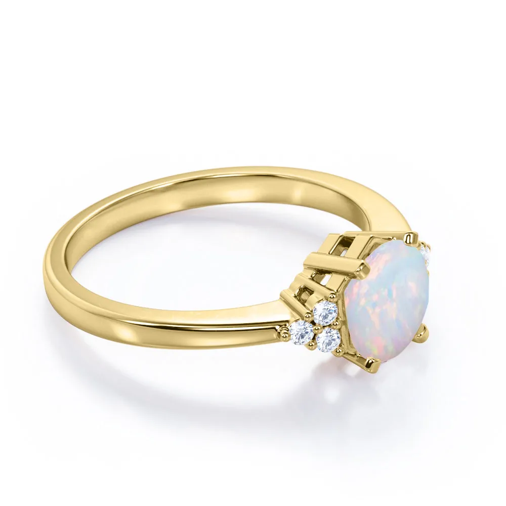 Unique Tapered style 1 carat Round cut Opal and diamond 7 stone engagement ring in Yellow gold