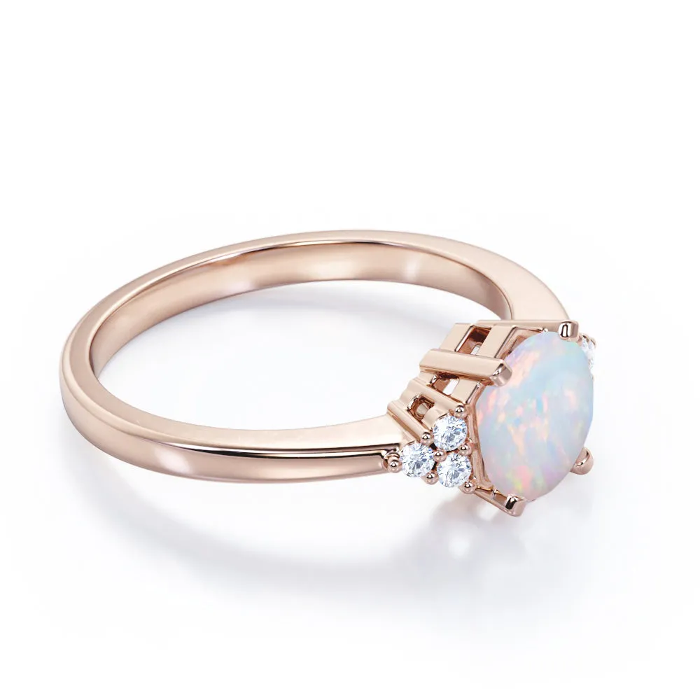 Unique Tapered style 1 carat Round cut Opal and diamond 7 stone engagement ring in Yellow gold