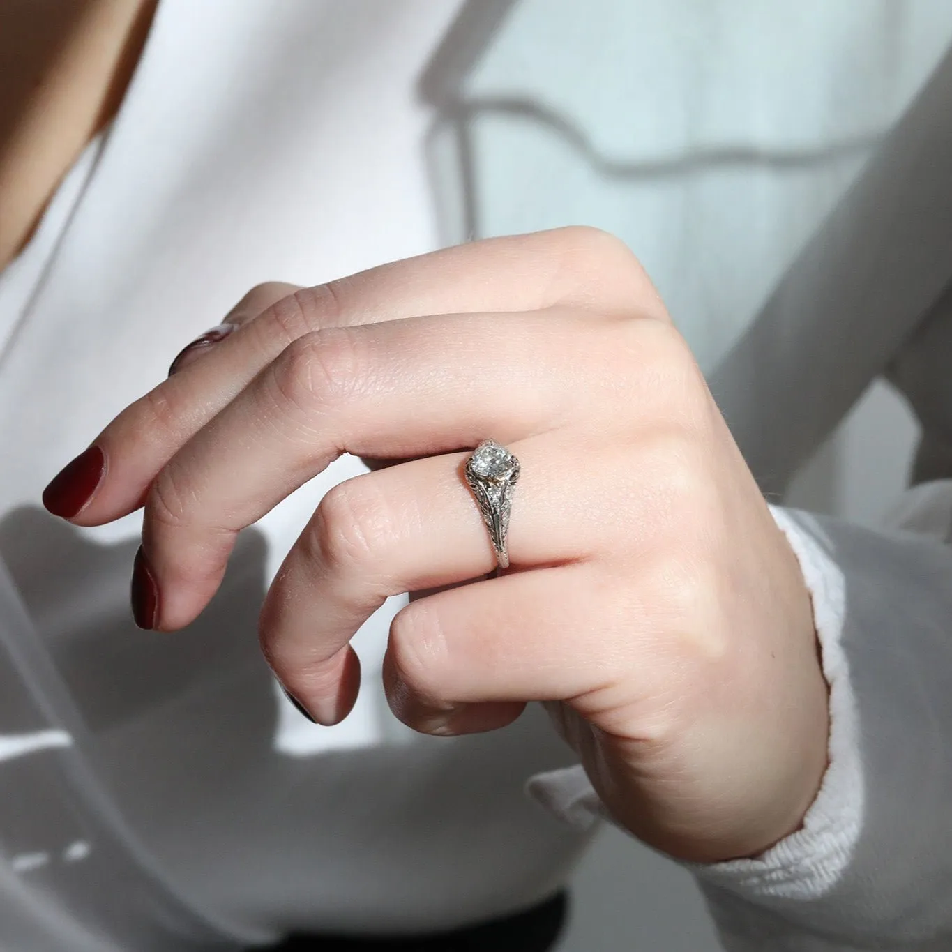 Vintage Platinum Ring with Oval Cushion-Cut Diamond