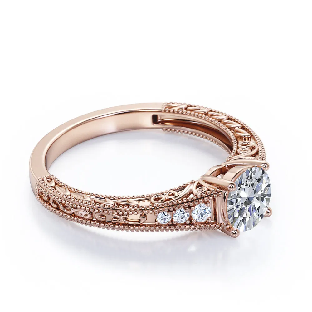 Vintage Tapered style 1.1 carat Round cut Moissanite and diamond Edwardian filigree engagement ring in rose gold